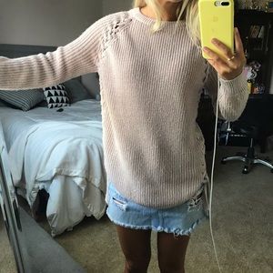Blush pink sweater with stitching on side